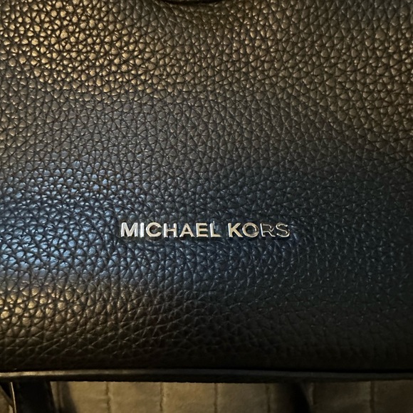 Women’s black leather Micheal Kors backpack purse